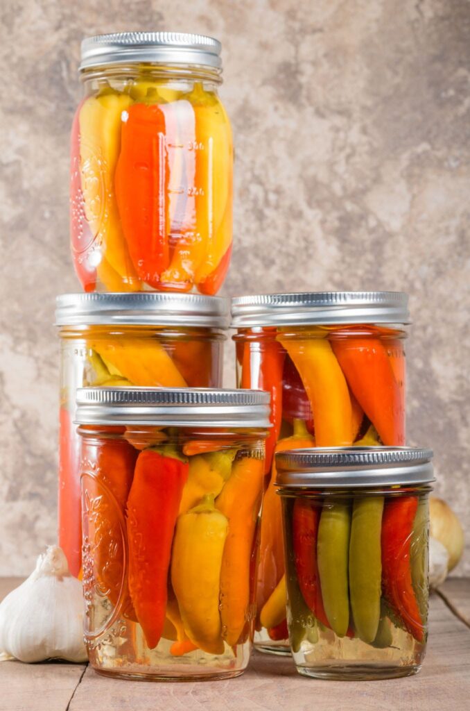 colorful jarred pickled peppers